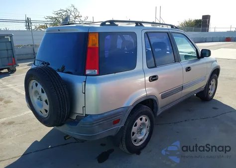 1999 Honda Cr-V Lx z USA, uszkodzony, nr VIN JHLRD2846XC015872
